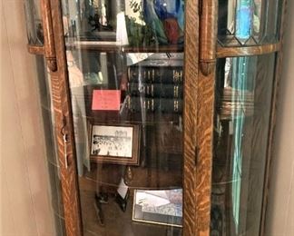 Curved front antique display cabinet