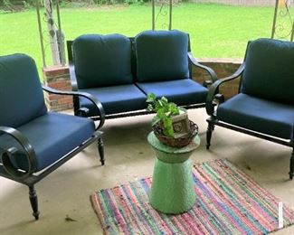 Settee and matching chairs with navy blue cushions