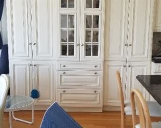 Gorgeous storage/china cupboard is part of this very large Wood-Mode kitchen