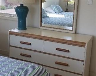Dresser with mirror has matching nightstand