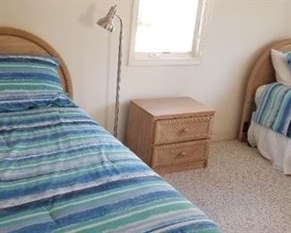 Twin bedroom set has two beds, one nightstand and a dresser with mirror