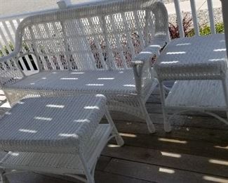 All-weather porch furniture with navy blue Sunbrella cushions 