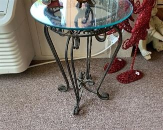 	#34	Glass top wrought iron table 16x24	 $20.00 	