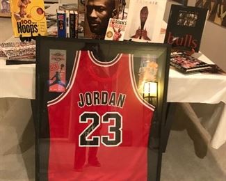 Framed Autographed Michael Jordan jersey with COA.