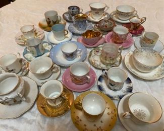 Demitasse and other china tea cups.  Zoom in to see amazing details