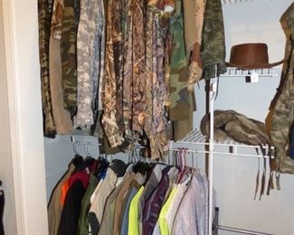 Hunting clothes, etc in Master Bedroom Closet.  Many MORE in backyard shed