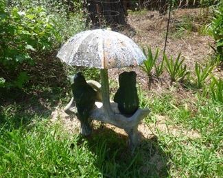 Concrete Frogs on bench