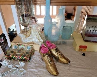 children's tea sets, old shoes, and child size cash register