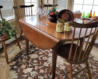 Dropleaf vintage table with 4 spindle back chairs