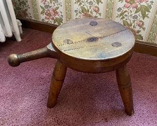 Antique milking stool