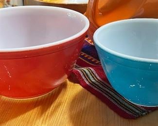 several Pyrex bowls