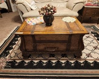 Rug and large square coffee table
