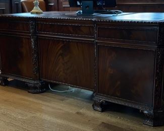 Vintage hand-carved flame mahogany desk. Measures 75" W x 41" D. Photo 6 of 6. 