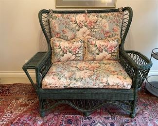 Vintage Henry Link Smithsonian Collection wicker settee with built-in magazine rack. Photo 1 of 2.
