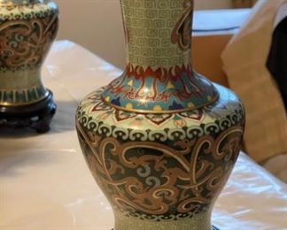 Pair of early 20th Century Chinese Cloisonné Vases on Stands. Each measures 12.25" H. Hexagonal baluster shape with flared lips and bases. 