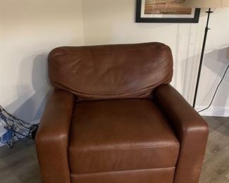 Leather upholstered club chair. There is some cat claw damage on the lower left side.  Photo 1 of 3. 