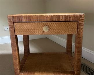 Pair of 1960s island-chic cane and rattan bedside tables with brass pull. Photo 1 of 3.