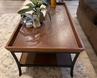 Cocktail Table. Measures 50” W x 26” D x 18” H. 