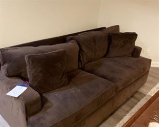 Brown Sofa Measures 81” W x 36” D - 2 available. One is a sleeper sofa. Photo 1 of 2. 