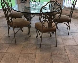 ROUND GLASS TABLE AND 6 CHAIRS