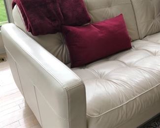 DETAIL OF WHITE LEATHER SOFA