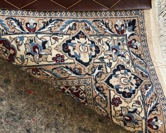 DETAIL OF AREA RUG HAND KNOTTED CARPET