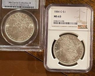 1887 and 1884 O Graded Morgans