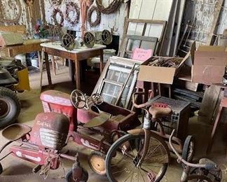 Antique tricycles, pedal cars and pedal tractors, furniture