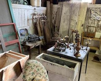antique doors, antique screen doors, wicker planters, weather vanes.