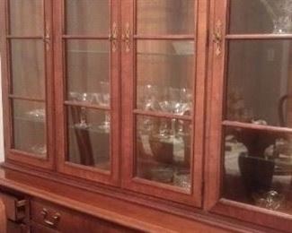 Beautiful 2-piece lighted China cabinet with hutch. Easy to move.