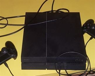 9.. .PLAYSTATION 4  WITH 2 CONTROLLERS  $200