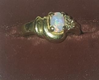 52. Nice opal ring 14 k $250