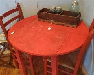 furniture red wood drop leaf round table
