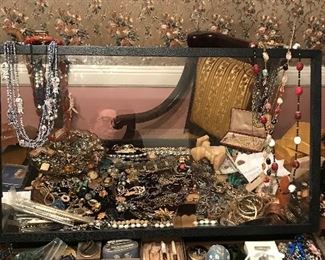 Table is full with jewelry some sterling 