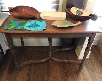 Vintage console table (as shown 45"L, 22”D, 31”H) Includes 2 leaves - expands to 42” deep with leaves in place & can be used as dining table. With Vera napkins, wooden bowls, Pacific Pottery low white planter