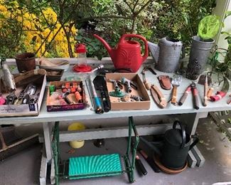 Garden stuff & yard tools, watering cans, sprinklers, kneeler & more - picnic table is for sale too.