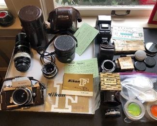 Original owner: 1967 Nikon F camera w/ 28mm f3.5 lens + Photomic TN thru-lens light meter, 2 additional Nikkor lenses w/ cases (50 mm f2, 200 mm f4), Albinar flash + assorted filters, lens protectors, shades. 