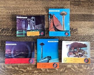 1962 Seattle World’s Fair souvenirs - it’s a postcard AND a record! We have many dozens of each design.