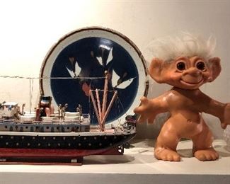 Wooden model ship, Gerald Newcomb studio pottery charger, giant 11” vintage troll, Fenton milk glass hobnail stretch vase
