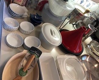 Kitchen: Assorted casserole & tart pans, Le Creuset red tagine, salad spinners, canning strainer
