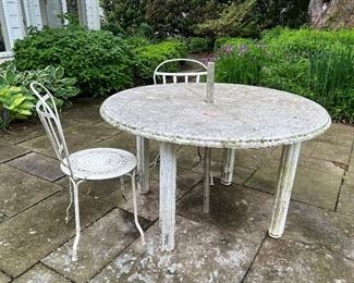 2 metal chairs with outdoor table