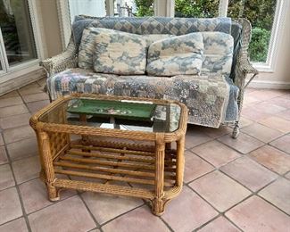Wicker sofa with glass top wicker coffee table