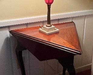 Hexagonal to hinged to Triangular sided end table with pink blown glass lamp