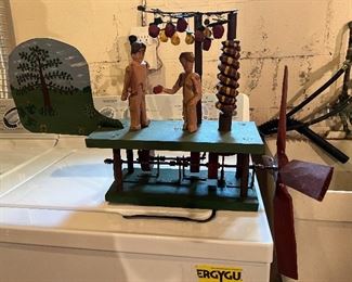 Adam and Eve wind activated garden ornament