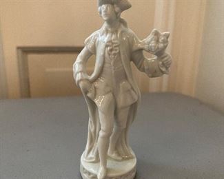 Capodimonte man with flowers figurine