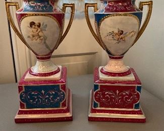 Matching porcelain urns made in Austria