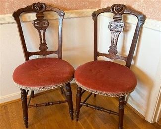 2 Antique Round-Seat Chairs with Pink Cushions

