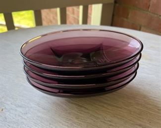 4 purple glass plates