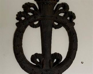 Cast iron Victory flame wall hanging