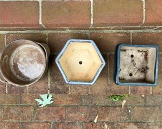 Outdoor clay, ceramic and metal pottery